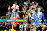 Orquestra VOadOra da rua, adaptados a uma formação de banda em que não há guitarras ou baixo, somente metais e percussão. O resultado é explosivo. A energia contagiante do público,